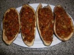 rellenar las berenjenas con mezcla de carne y verduras